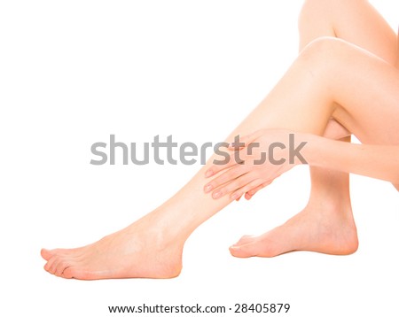 Beautiful legs and arm isolated on a white background