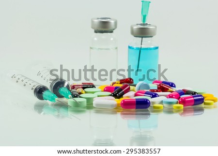 medical syringe and medicine  isolated on white background