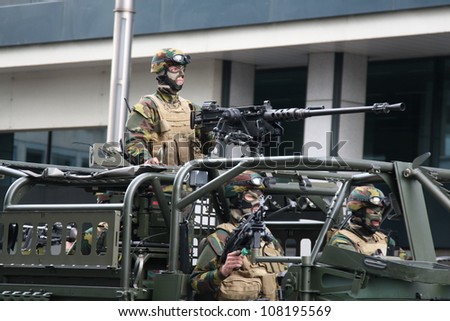 BRUSSELS, BELGIUM - JULY 21: military soldiers during national day parade July 21, 2012 in Brussels, Belgium.