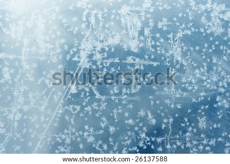 Frosty natural pattern on winter glass