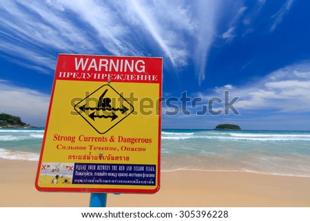 Warning strong currents & dangerous sign (English, Russian and Thai language).