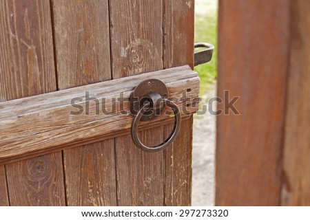 open old door of wood with metal handle