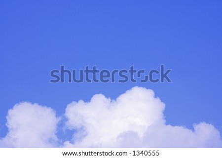 Clouds with a big free area of blue sky