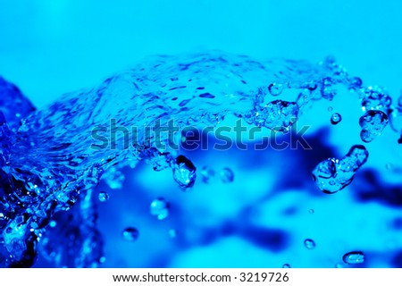 macro water wave with splash; shallow DOF (water series B)
