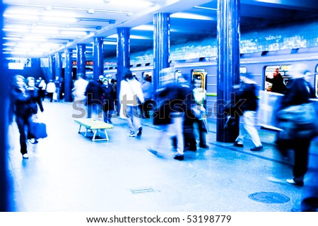 A busy subway station at rush hour. Long exposure high key effect shot. Incorrect white balance