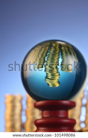 conceptual image  coin in the crystal ball