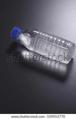 mineral water bottle on the dark background