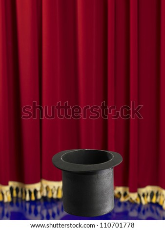 empty top hat in front of the stage