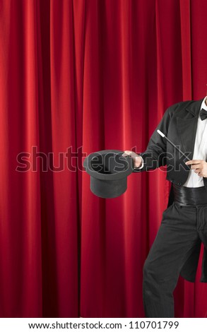 Magician Holding Magic Wand and Top Hat
