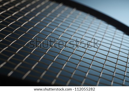 Close-up of top of tennis racket