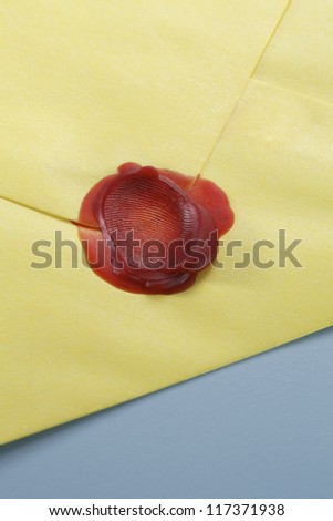 Thumbprint wax seal on envelope