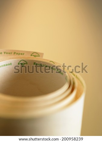 rolled up recycle adding machine tape