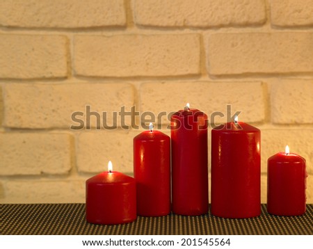 row of candle light with different height