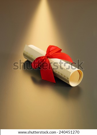 roll up certificate with red ribbon