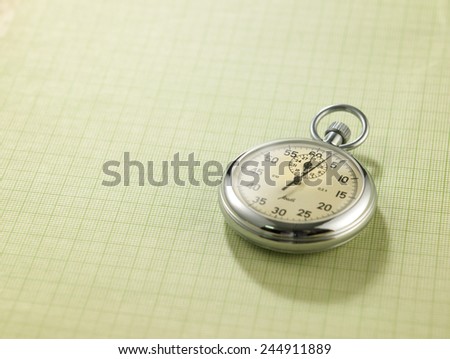 stop watch on the checker exercise book