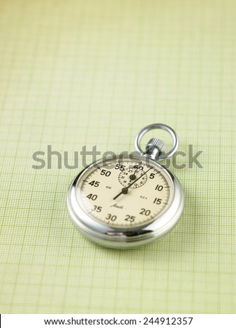stop watch on the checker exercise book