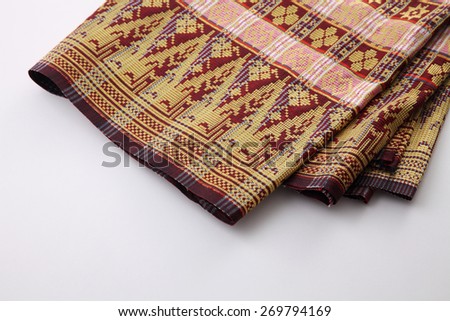 Malaysia Songket .Songket is a fabric that belongs to the brocade family of textiles of Indonesia, Malaysia and Brunei. It is hand-woven in silk or cotton