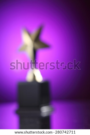 blur image of the star trophy- dream since too far away
