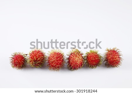 asian fruit rambutan on the plain background