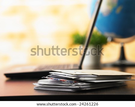letter on the office table with lap as back ground