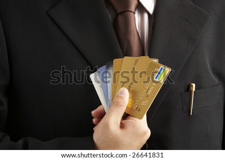 a man show numerous of credit cards