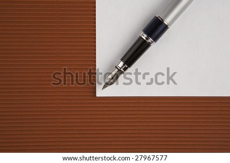 concept shot of the pen and paper