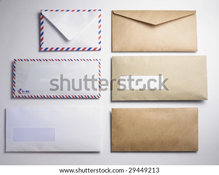 few different type of the envelope on thew plain background