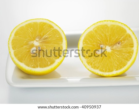 slices of lemon on the white back ground