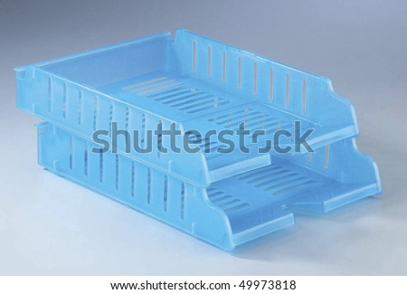 Plastic file rack in blue colour.