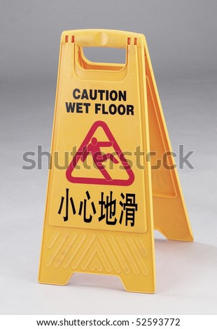 Caution wet floor sign isolated on clean background.