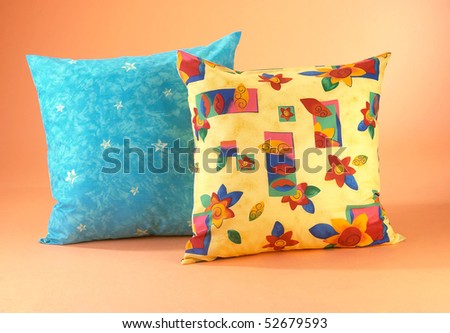 Studio shot of two pillows / cushions isolated on clean background.