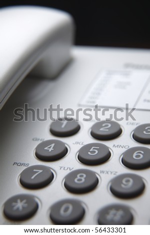 close up of the phone key pad