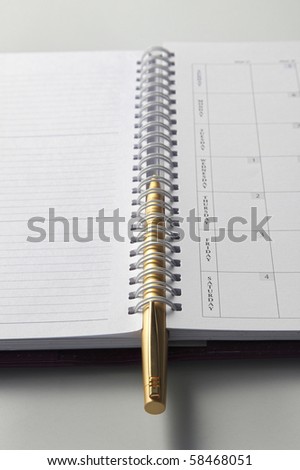 pen on the note book