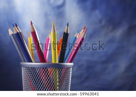 group of the color pencil on the blue background