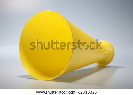 A Yellow Plastic Haler For Making Announcement In Public