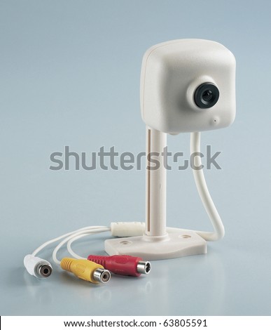 Web camera isolated on plain background with cable.