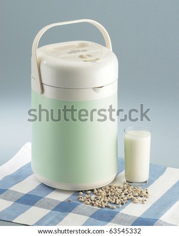 Glass of soy bean milk and peanut isolated on plain background.