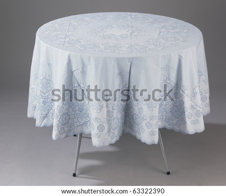A round table covered with a table cloth