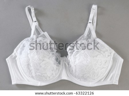 White pat lacy bra insulated on grey background