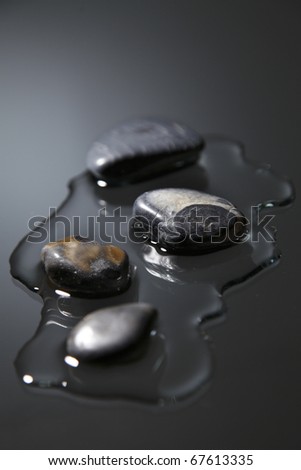 stone and water on the gray background