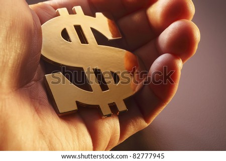 stock image  gold and money using dollar sign