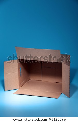 Empty Cardboard Box on the blue background