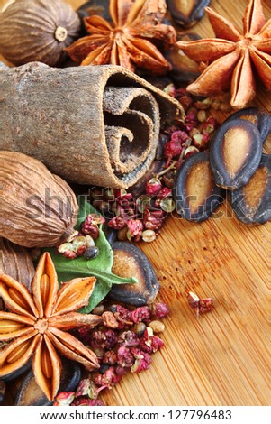 Macro of Cinnamon, Sichuan Pepper, Star Anise and other Assorted Spices used in Asian Cooking