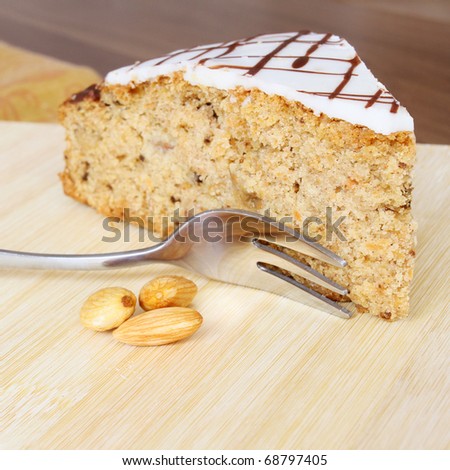 Carrot cake. Freshly baked and served with almonds