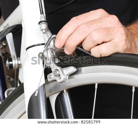 Bicycle maintenance. Fixing the breaks on a road bike.