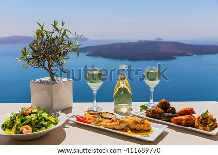 Lunch and wine by the sea, Greece, Santorini