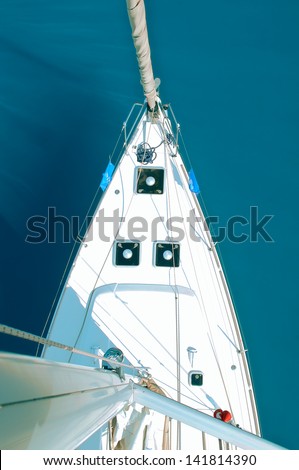 view from the top on a sailing yacht on a sea background view from the top on a sailing yacht on a sea background