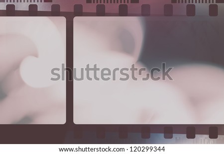 Grunge film strip frame with light leak