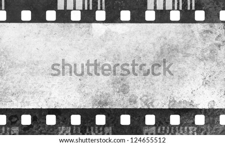 Great dark film strip for textures and backgrounds with light leak