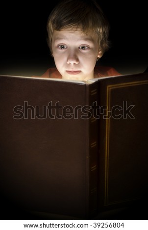 Boy reading bedtime story